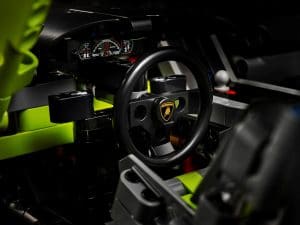 The working steering wheel of the Lamborghini Sián FKP 37 model can be used to position the car, and the paddle shift works to change gears.
